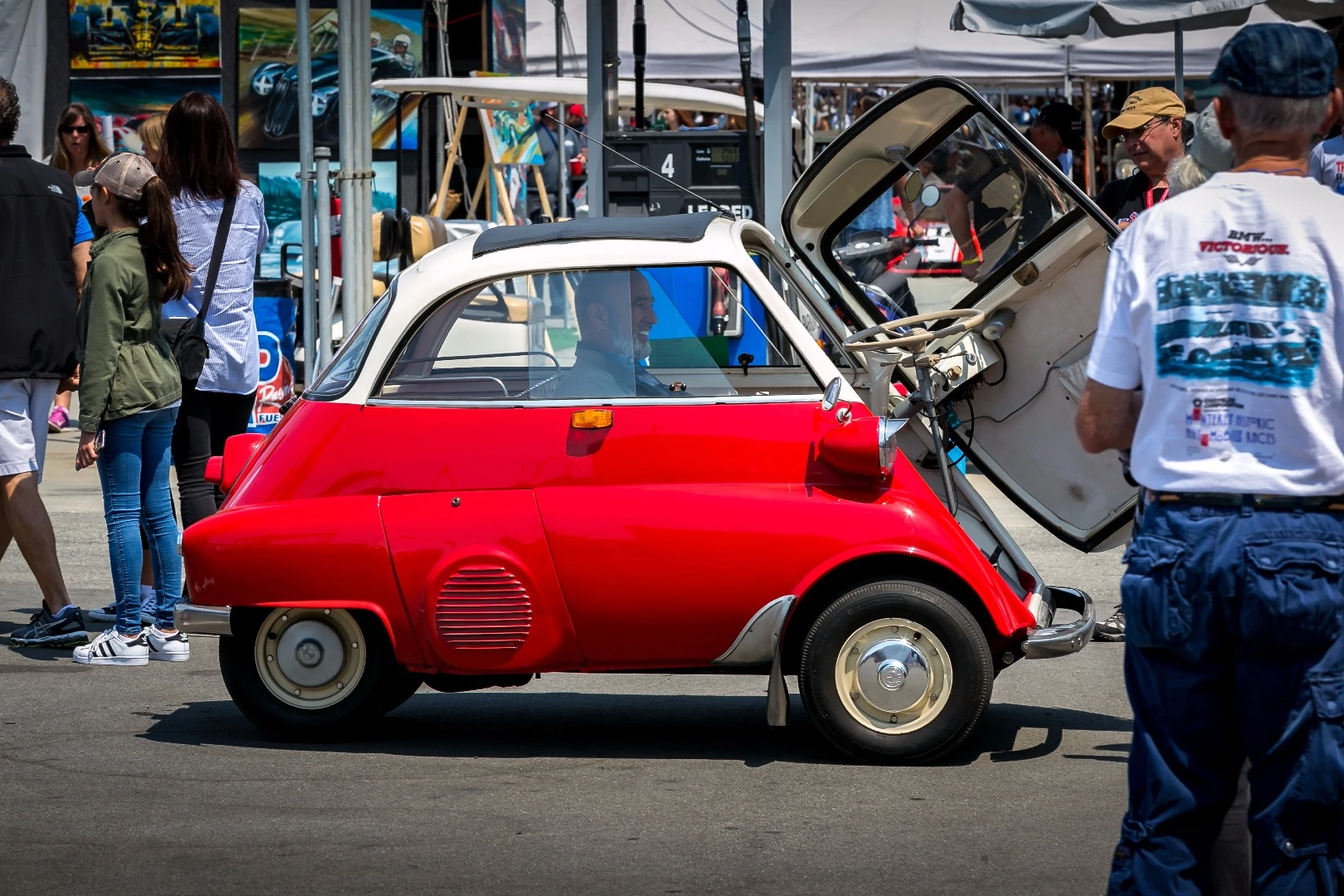 BMW'S iconic Isetta entertains at the entrance to the BMW tent