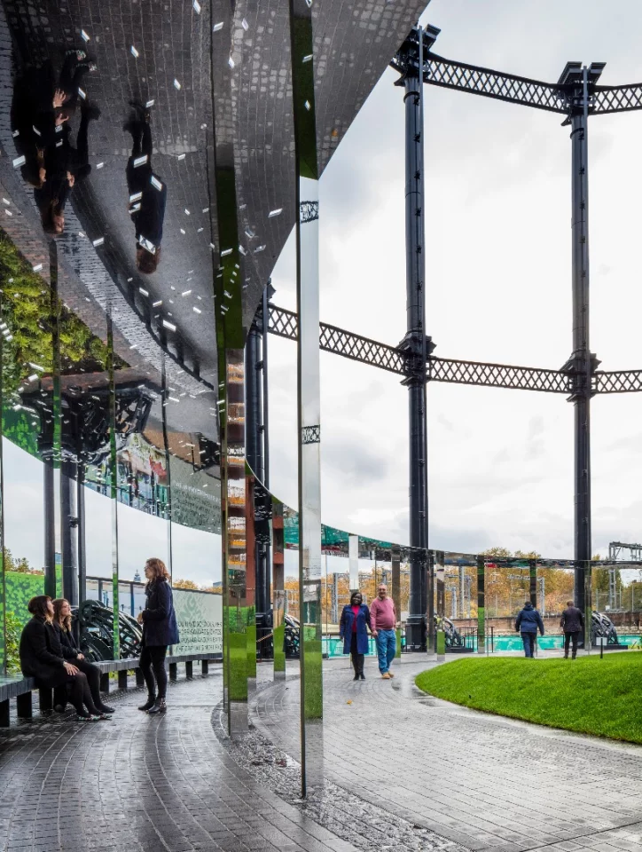 A new steel canopy encircles the edge of the park, providing shelter