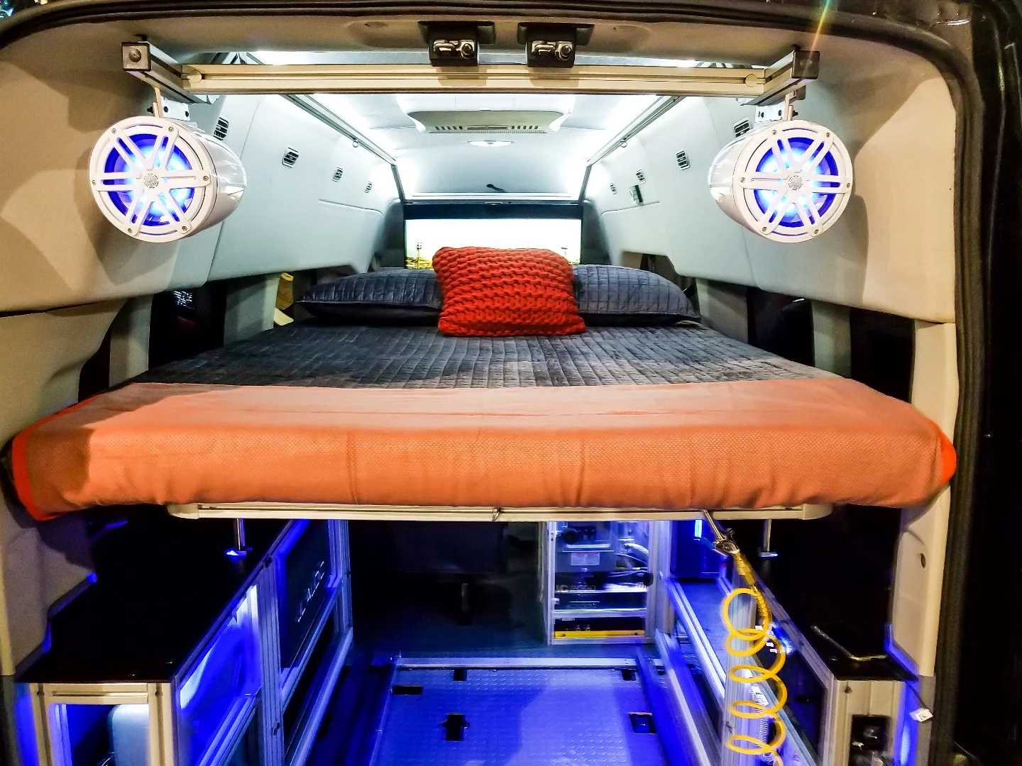 A look at VanDoIt's hydraulic-lift bed and rear speaker system