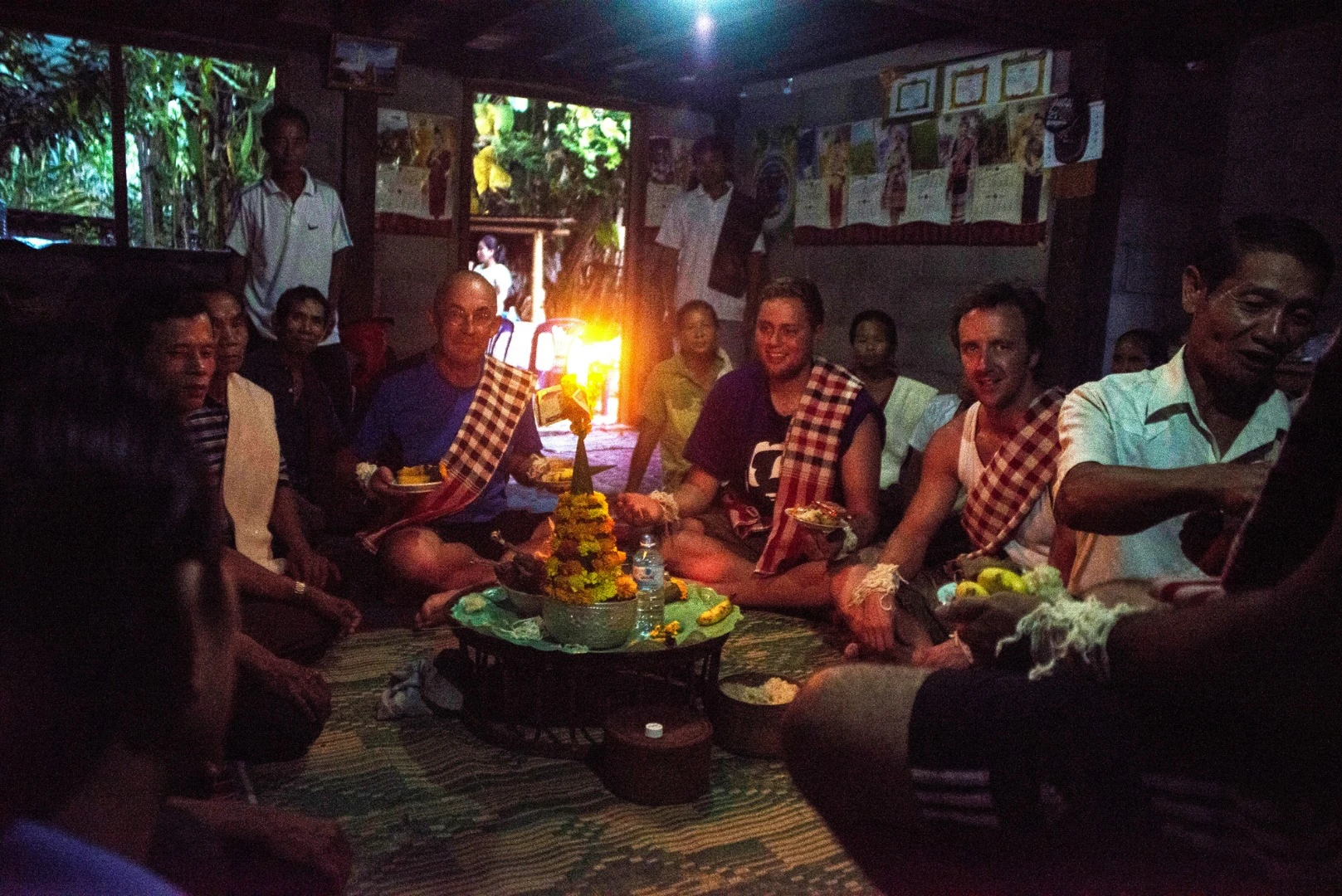 One of the three Baci ceremonies we experienced as we visited each village. These ceremonies are deeply heartfelt. Mike, Josh and Charlie being royally welcomed.