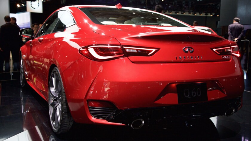 The coupe’s roofline is fastback to the rear
