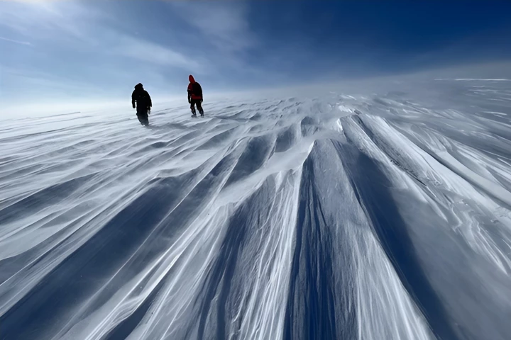 The Prudhoe Ice Sheet rises gradually over hundreds of miles