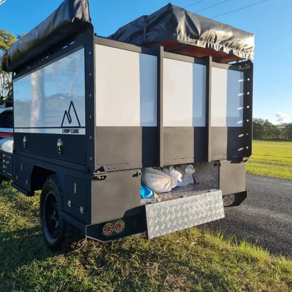 The base trailer's center storage floor becomes a storage tunnel ... perfect for carrying out garbage from a campsite without services