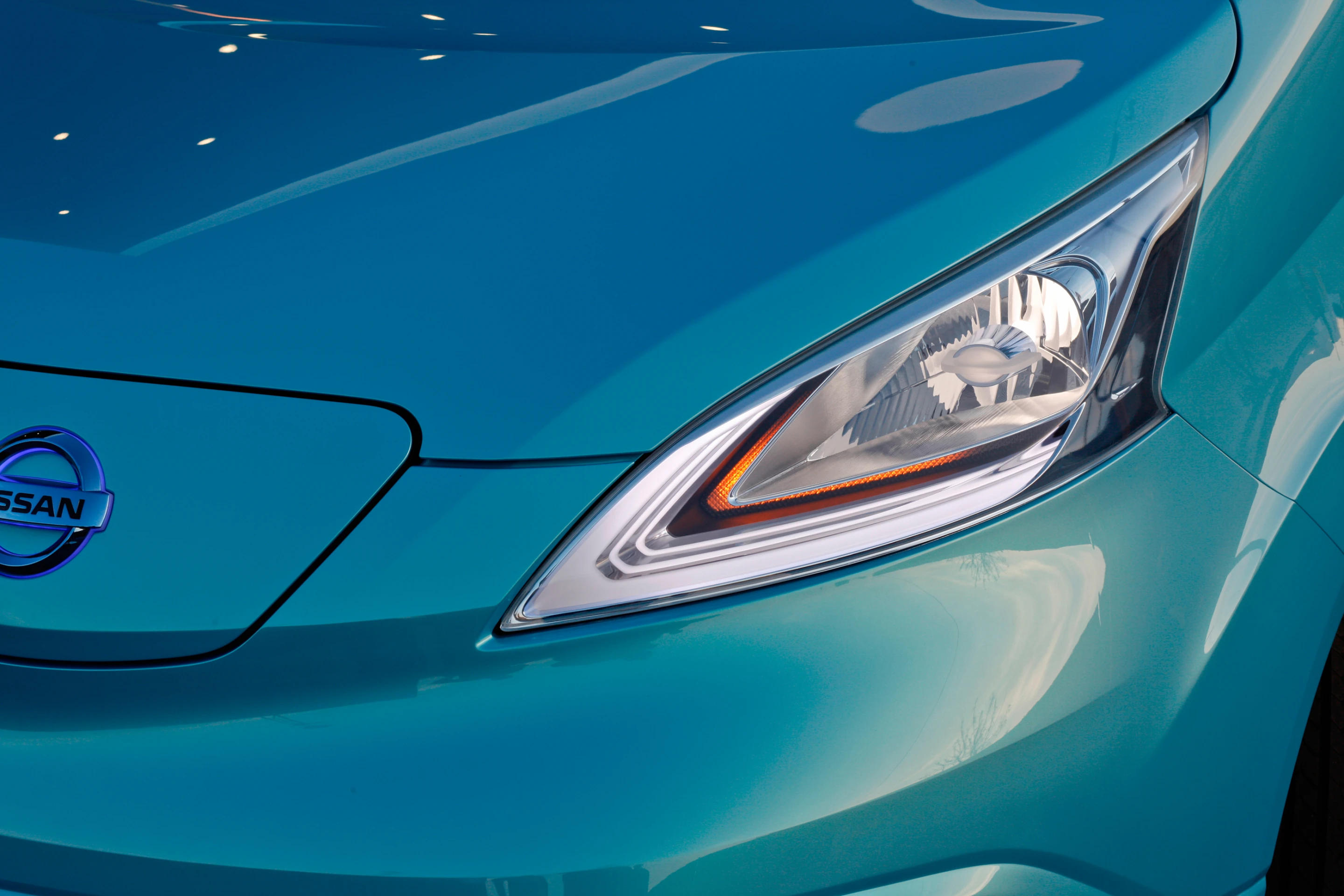 The e-NV200's headlights have LED-illuminated accents