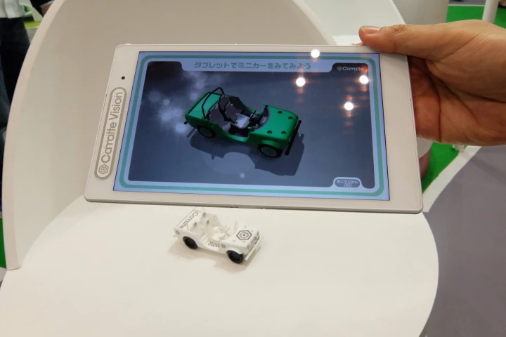 Your chosen design is rendered on to an image in augmented reality