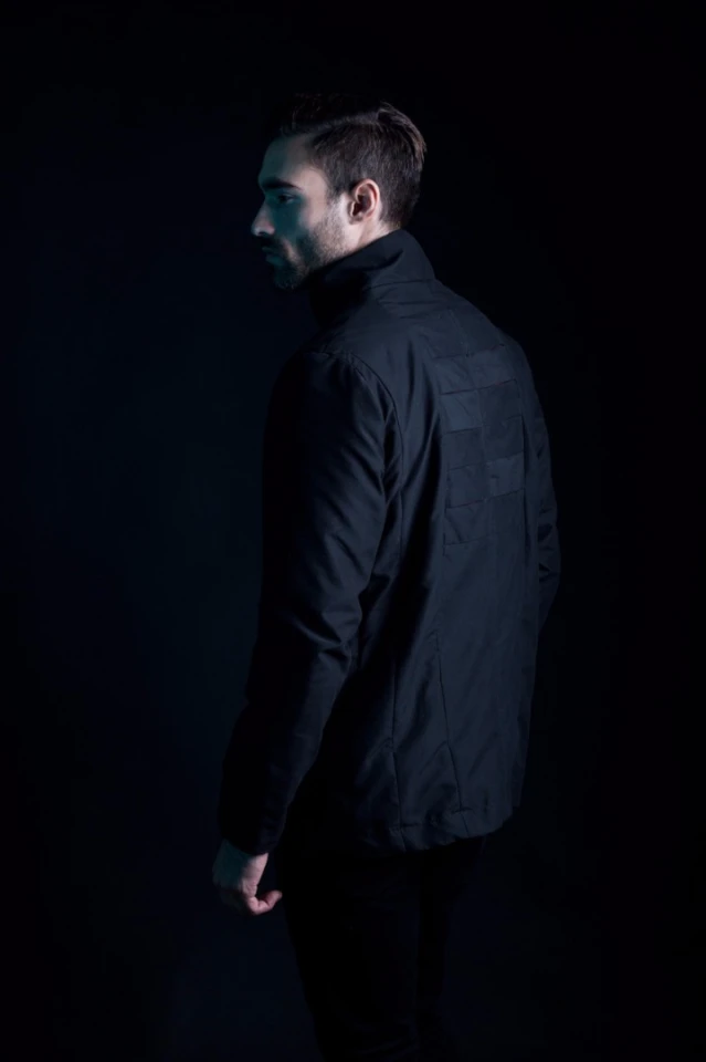 When closed, the Omius jacket is designed to work like a waterproof/windproof winter jacket