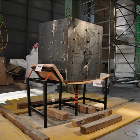 Two designers have developed an "earthquake-proof" desk that can absorb the impact of up to a ton of weight and even provide escape routes for rescue crews to reach trapped students