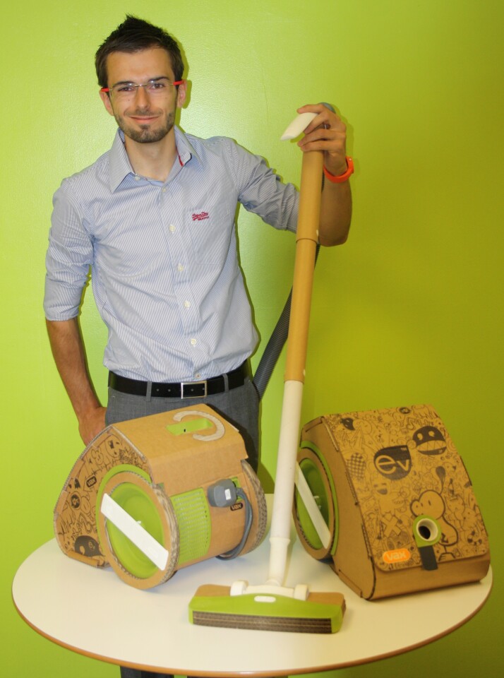 Jake Tyler showing off his Vax ev cardboard vacuum cleaner prototype