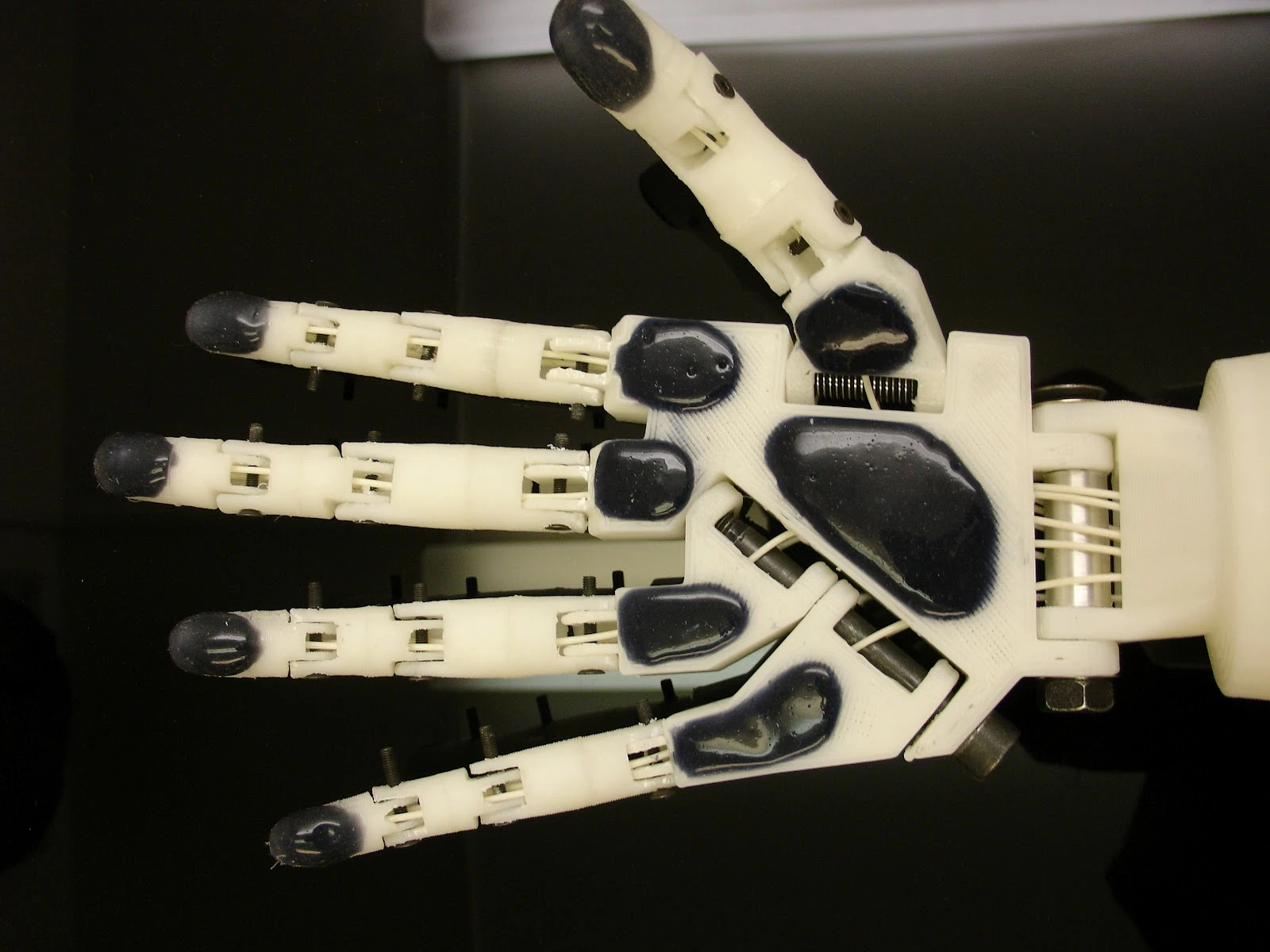 InMoov's hands have fully articulated fingers and silicone padding to help it grasp objects