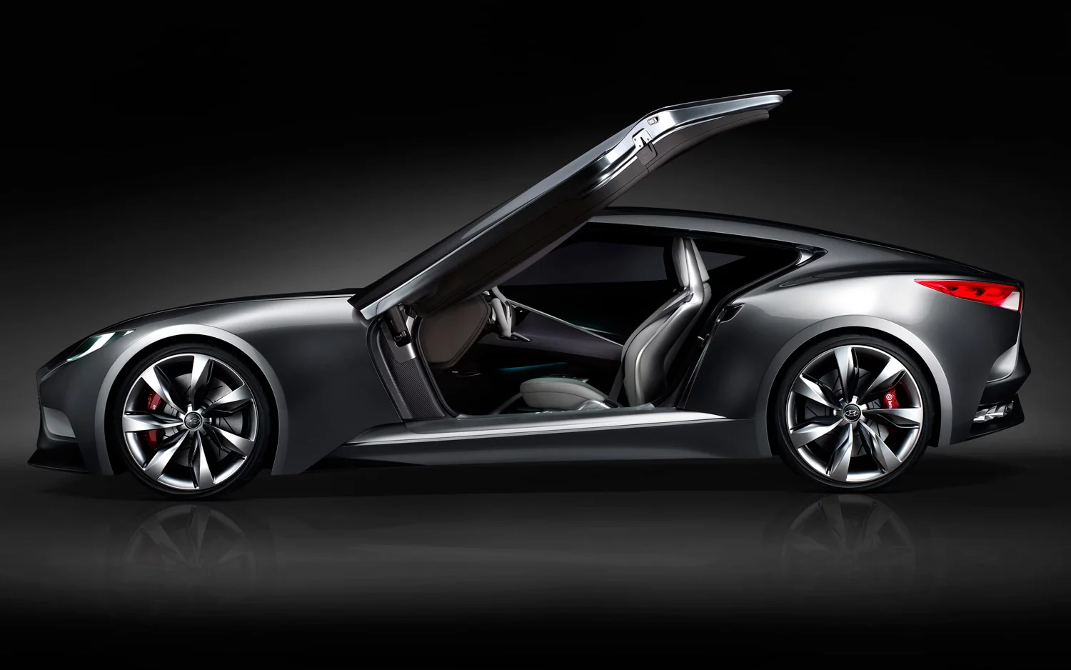 The interior is a replete with dynamic spiral-shaped metal lines that frame the interior throughout