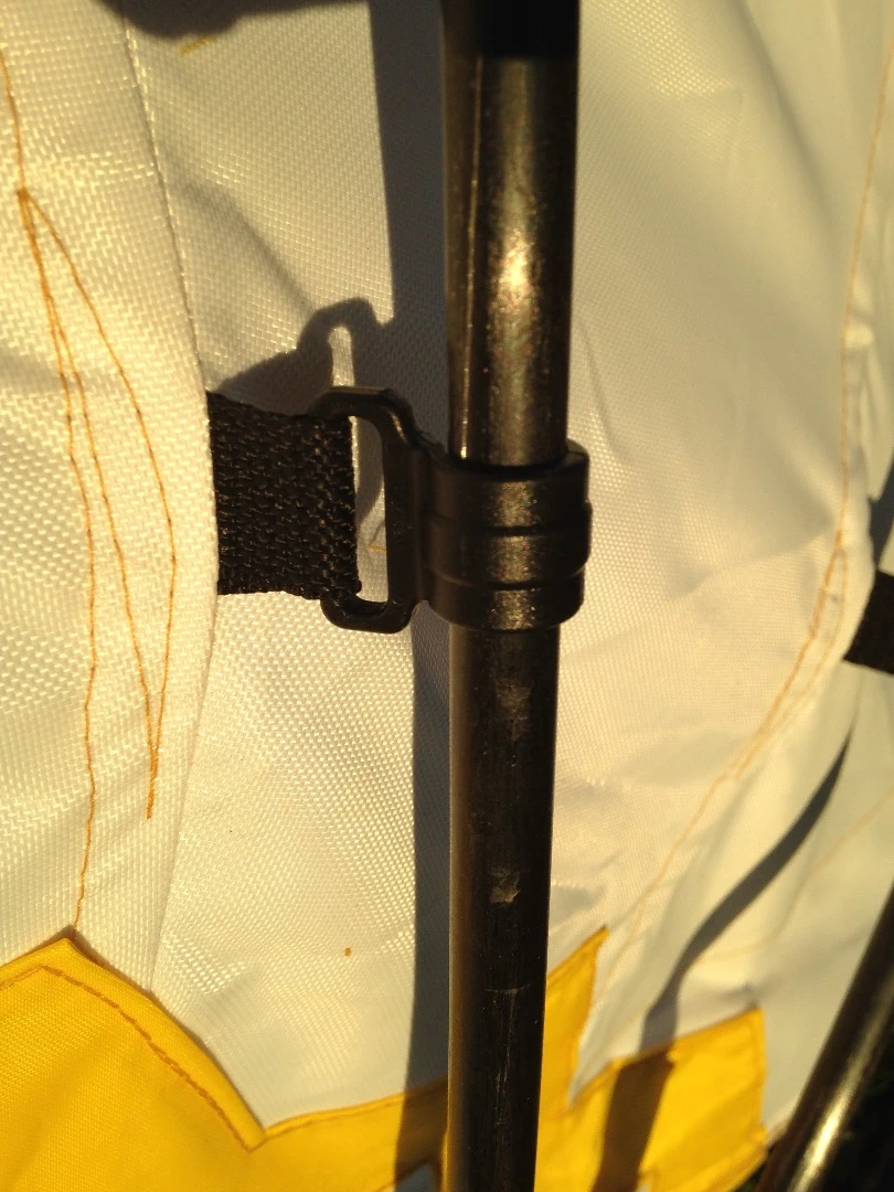 The tent fabric clips to the fiberglass poles