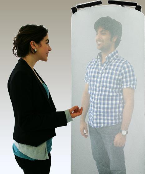 Telehuman: a series of Microsoft Kinect sensors and 3D camera equipment team up to capture the three-dimensional image of each conversant
