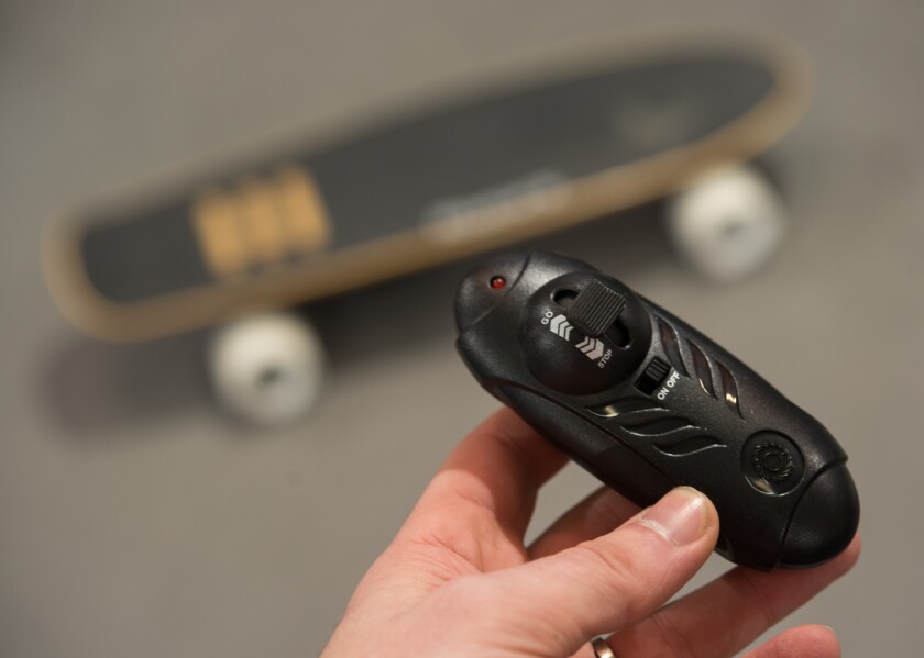 The remote control for the RazorX Cruiser Electric Skateboard