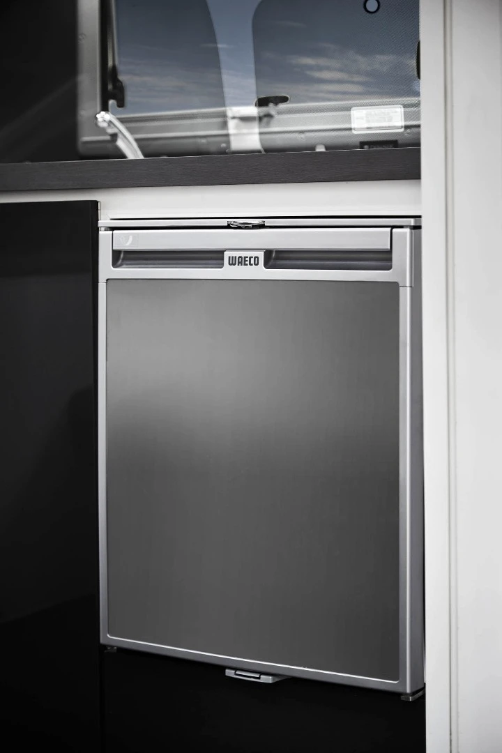 A 12 V Waeco fridge comes standard and buyers can also add an outdoor fridge