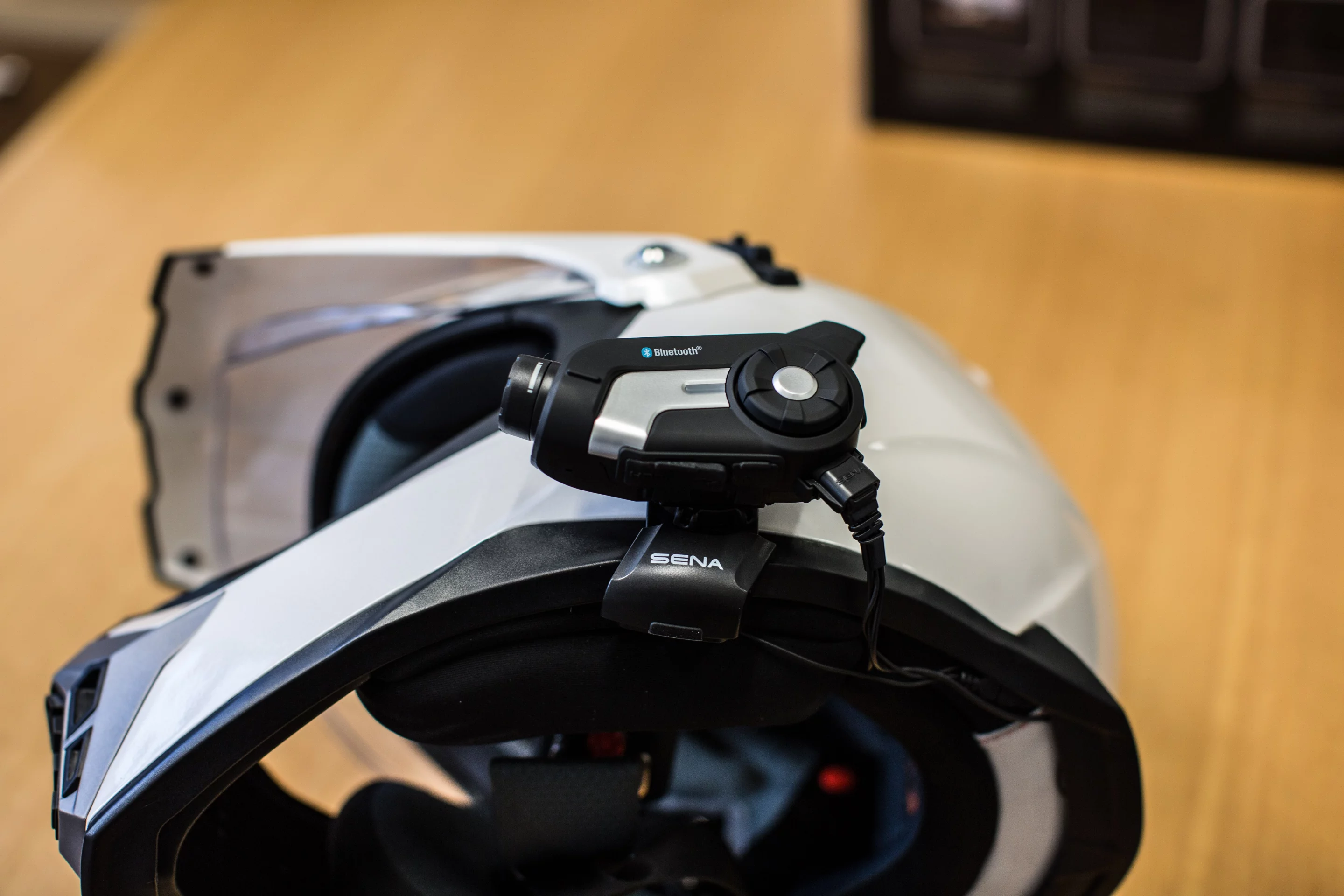 Sena's 10C - unit clips off for charging and security (Photo: Loz Blain/Gizmag.com)