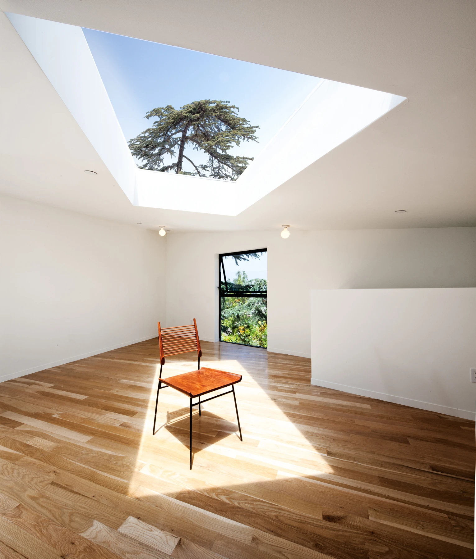 The home's unusual geometry derives from the lot's own unusual shape – an inverted parallelogram