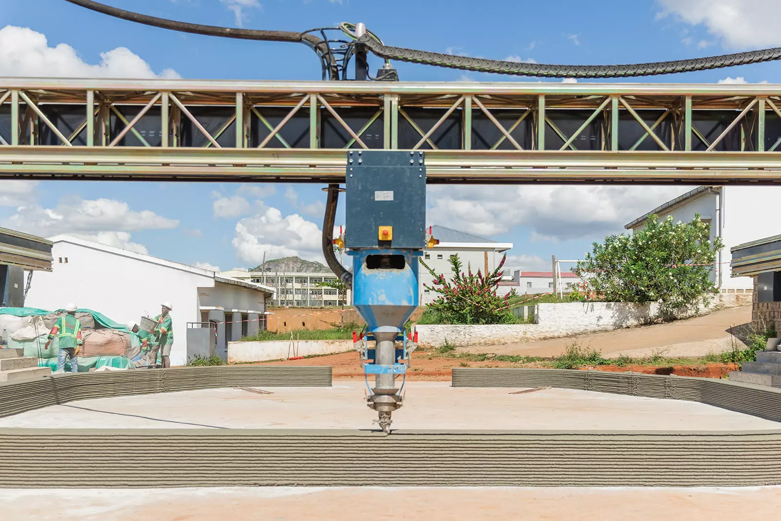 Bougainvillea's construction process involved a 3D printer extruding a cement-like mixture out of a nozzle in a pattern to build up the basic walls
