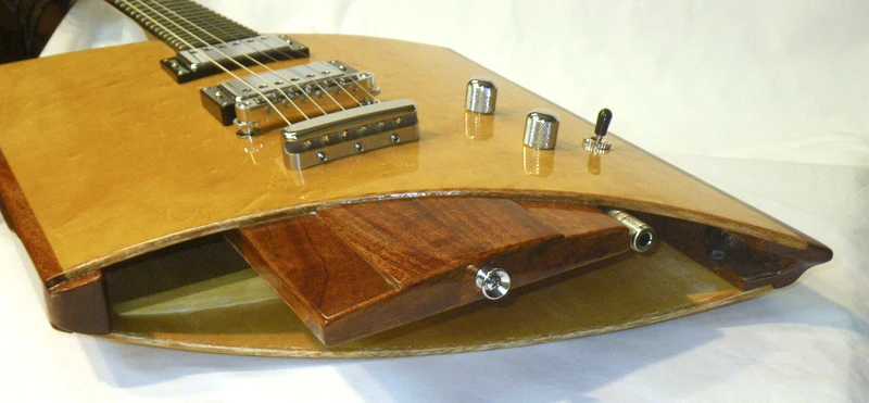 The through neck doesn't come into contact with the player's body, offering more natural sustain and note clarity