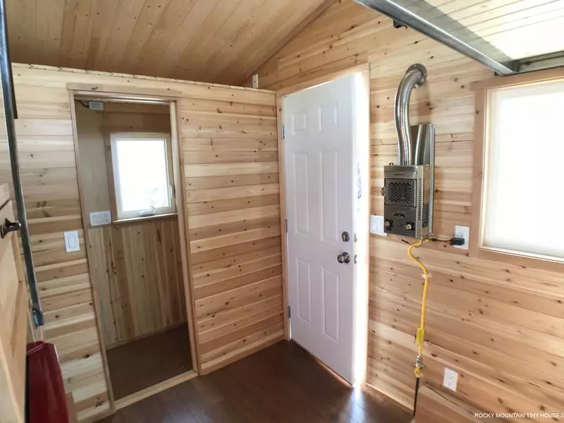 The Rhode Island Red is kept warm with a small propane-powered furnace