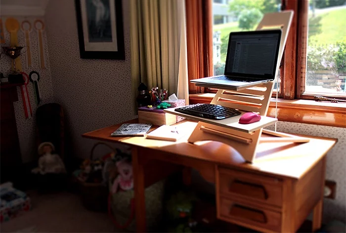 Elevate makes it possible to use any existing desktop or table surface as a standing desk surface for your laptop
