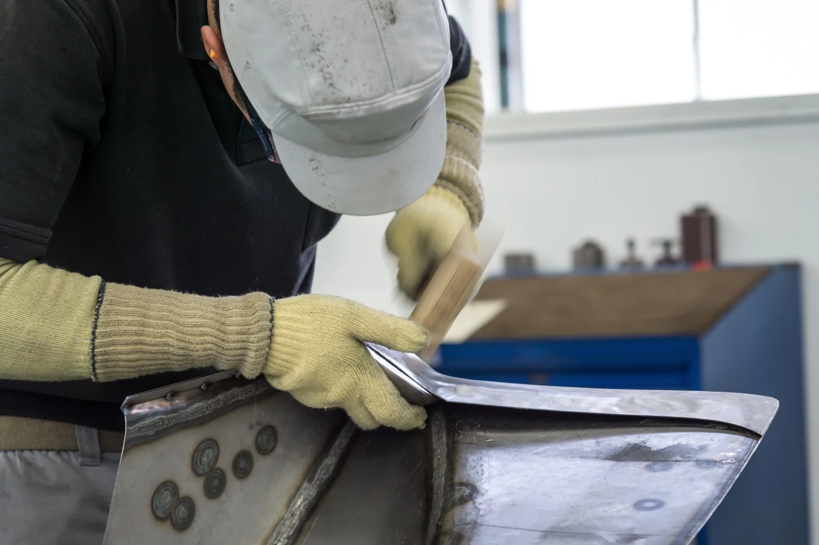 Infiniti goes to work on the body panels of the Prototype 9