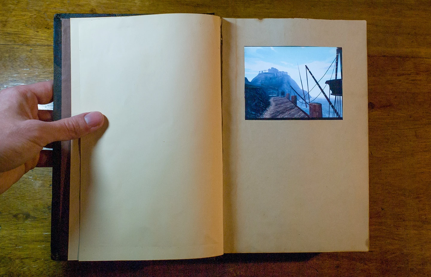 The real-life Myst linking book features a touchscreen allowing gamers to play all the Cyan titles
