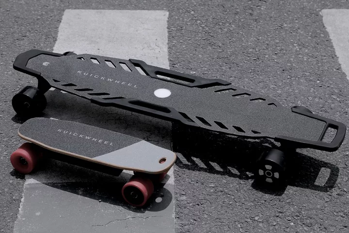 The Serpent-C (bottom left) and Serpent-W electric skateboards from Kuickwheel