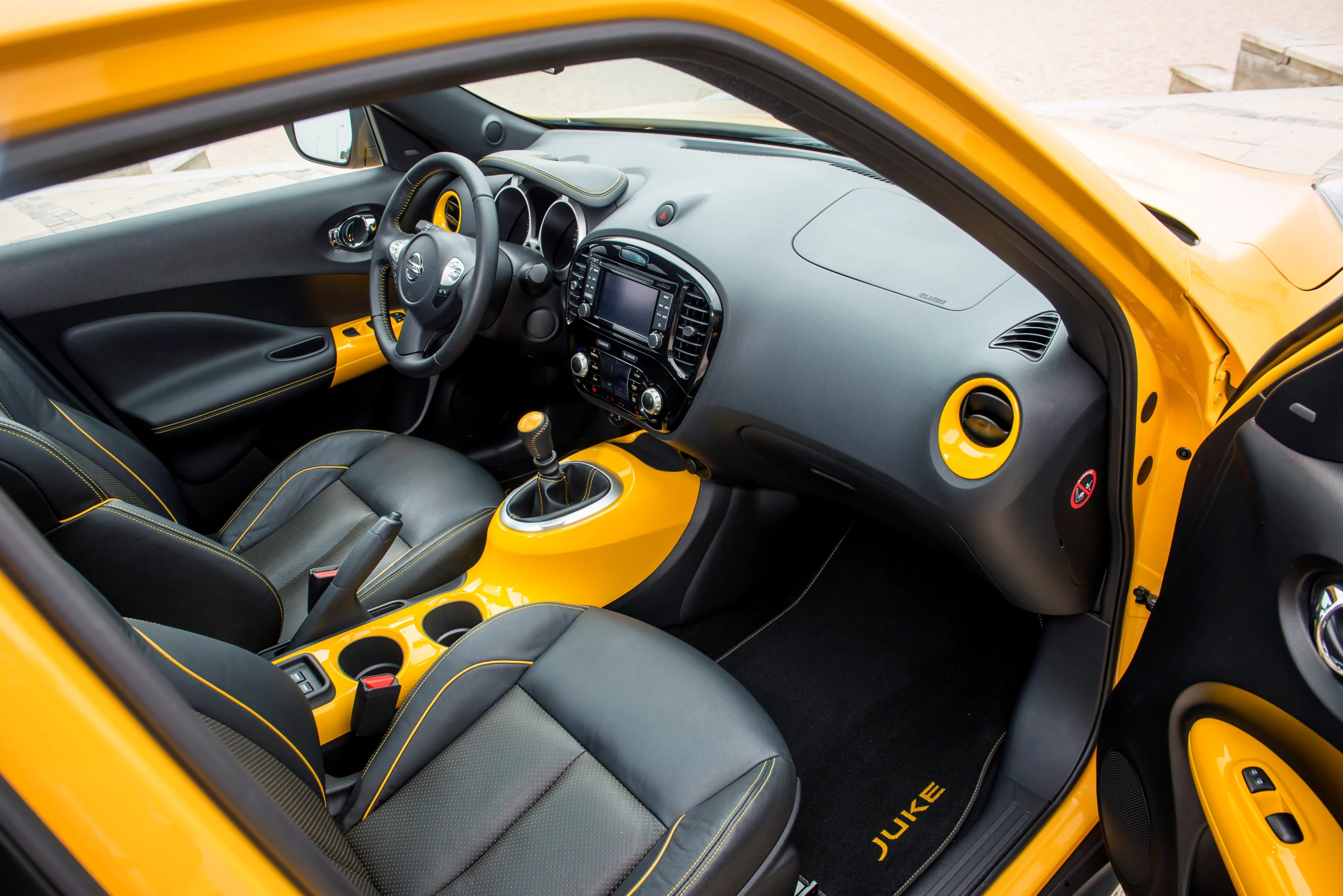 Nissan let's owners change their Juke’s center console, door finishes, air vent rings, and the gear knob stitching, steering wheel, seats and meter hood lid leather cover, if they so choose