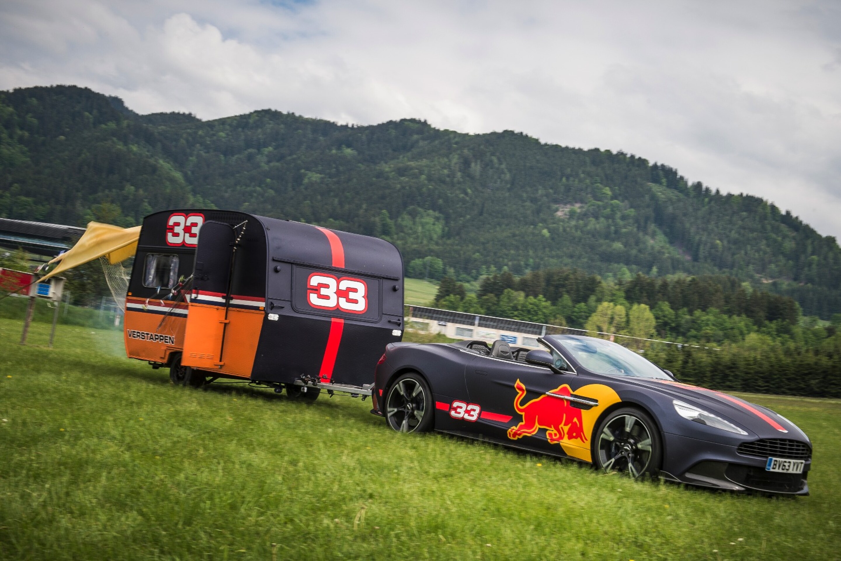 Video F1 drivers battle it out in Aston Martins towing caravans