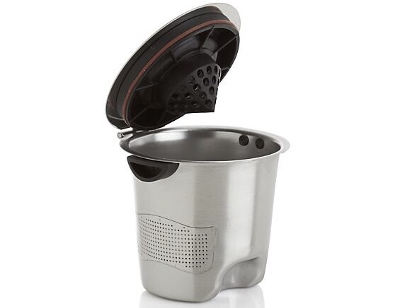 The new stainless steel version features a silicone O-ring seal, heat-resistant grips, a water dispersion cone, and a heavy-duty piano-style hinge