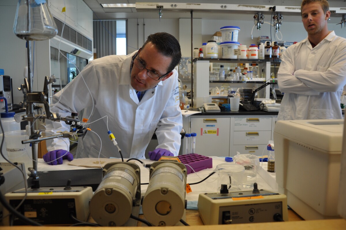 Jacob D Lanphere, left, and Corey Luth, work in the lab of their adviser Sharon Walker