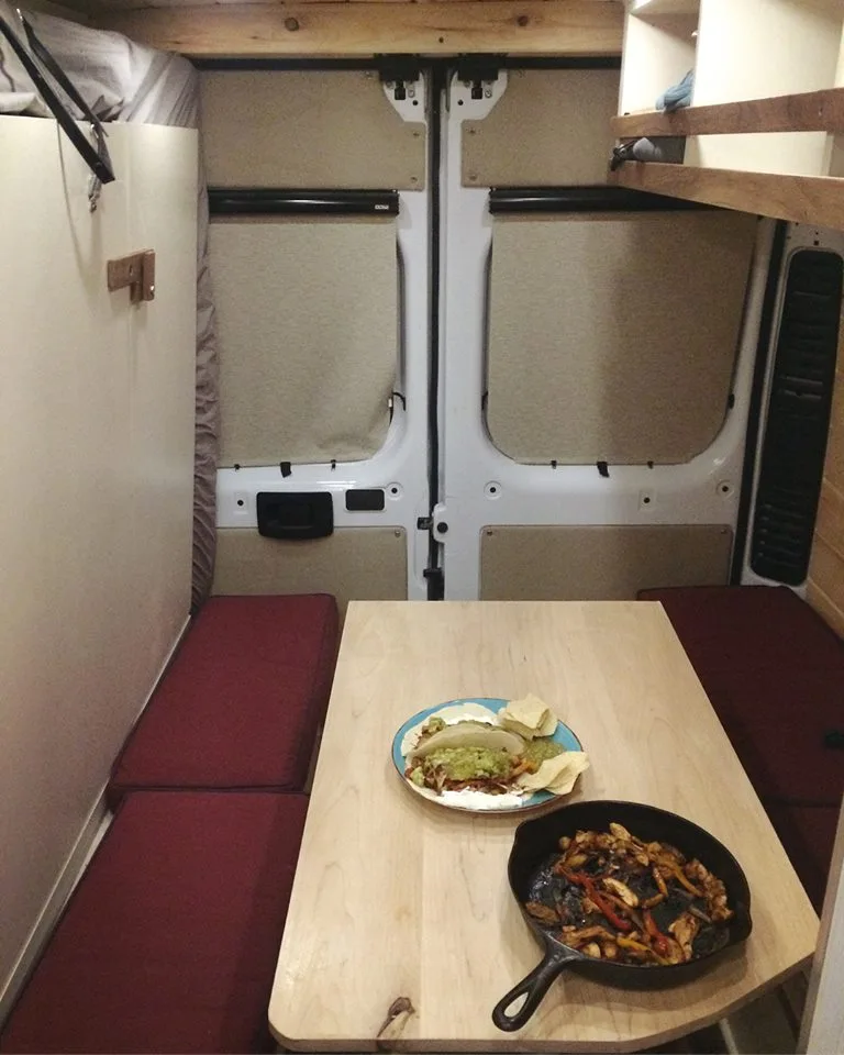 Notice the Murphy bed against the looker's left wall. Off Grid says it takes under a minute to move the table out of the way and drop the bed for sleep configuration. Or they can work with the customer on installing a lowering table