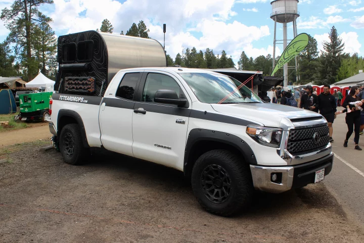 The Truck Camper has a distinctive vertical-back teardrop-style shape to it