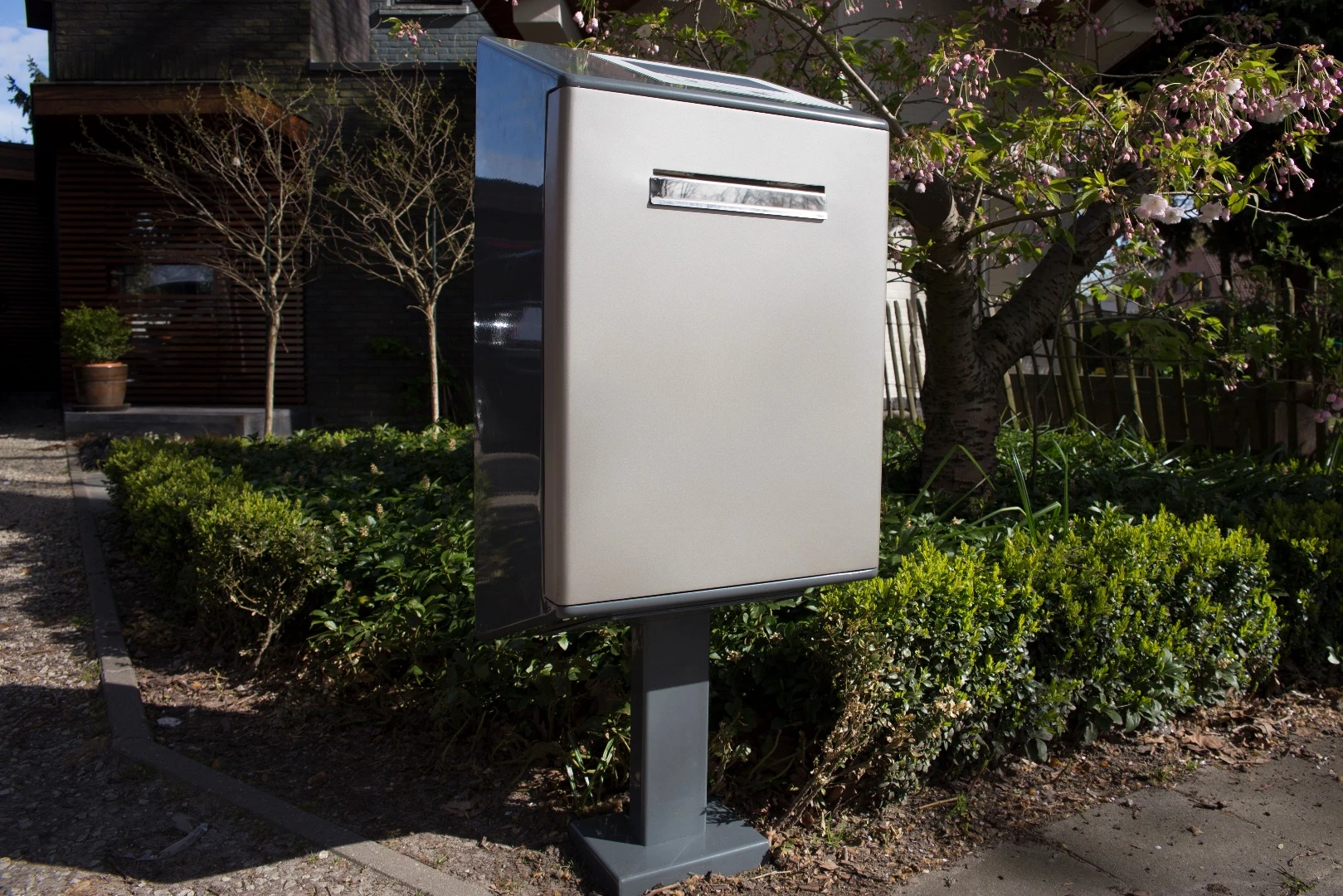 Package carriers, and even local shops and supermarkets, can gain access to a locked smart letterbox via a companion smartphone app