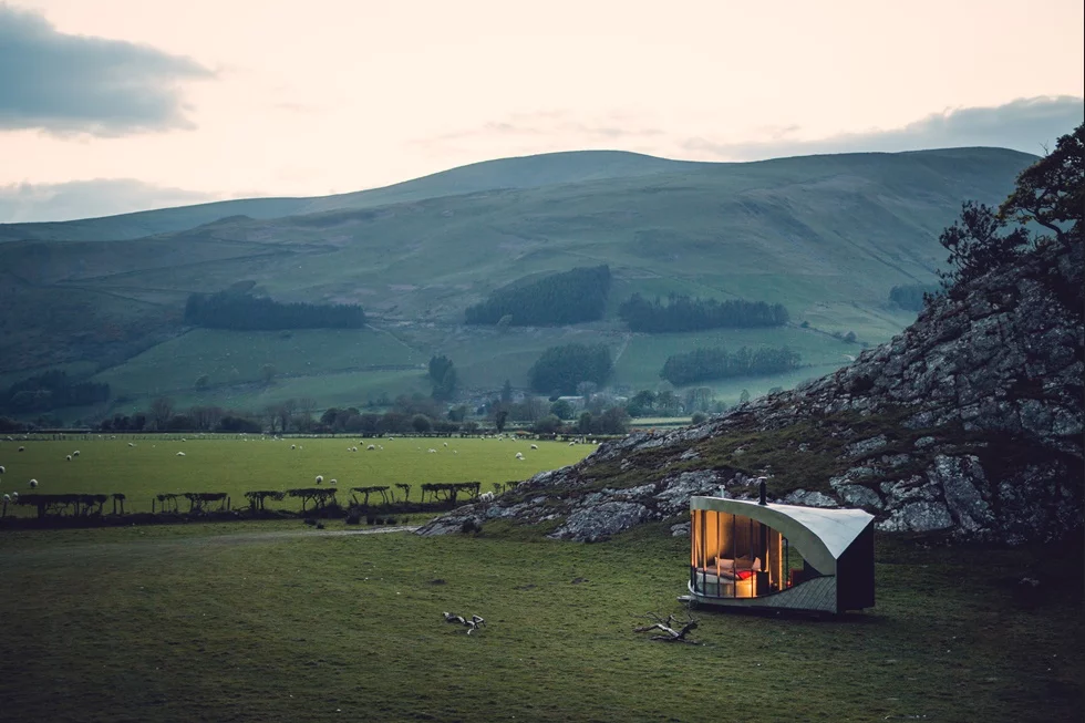 Dragon'sEye is a 12.5 sq m (34.5 sq ft) tiny cabin built by Welsh architectCarwyn Jones