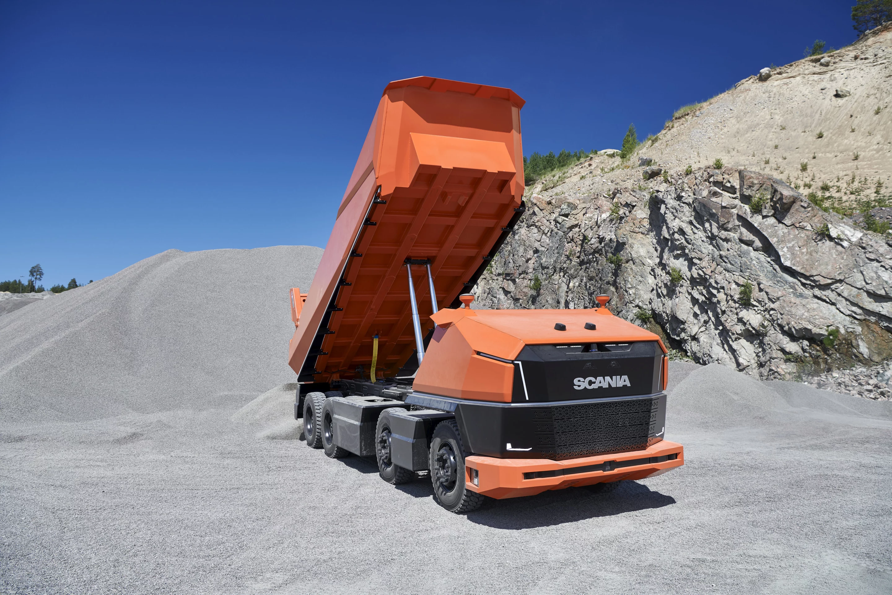 The AXL dumps its load