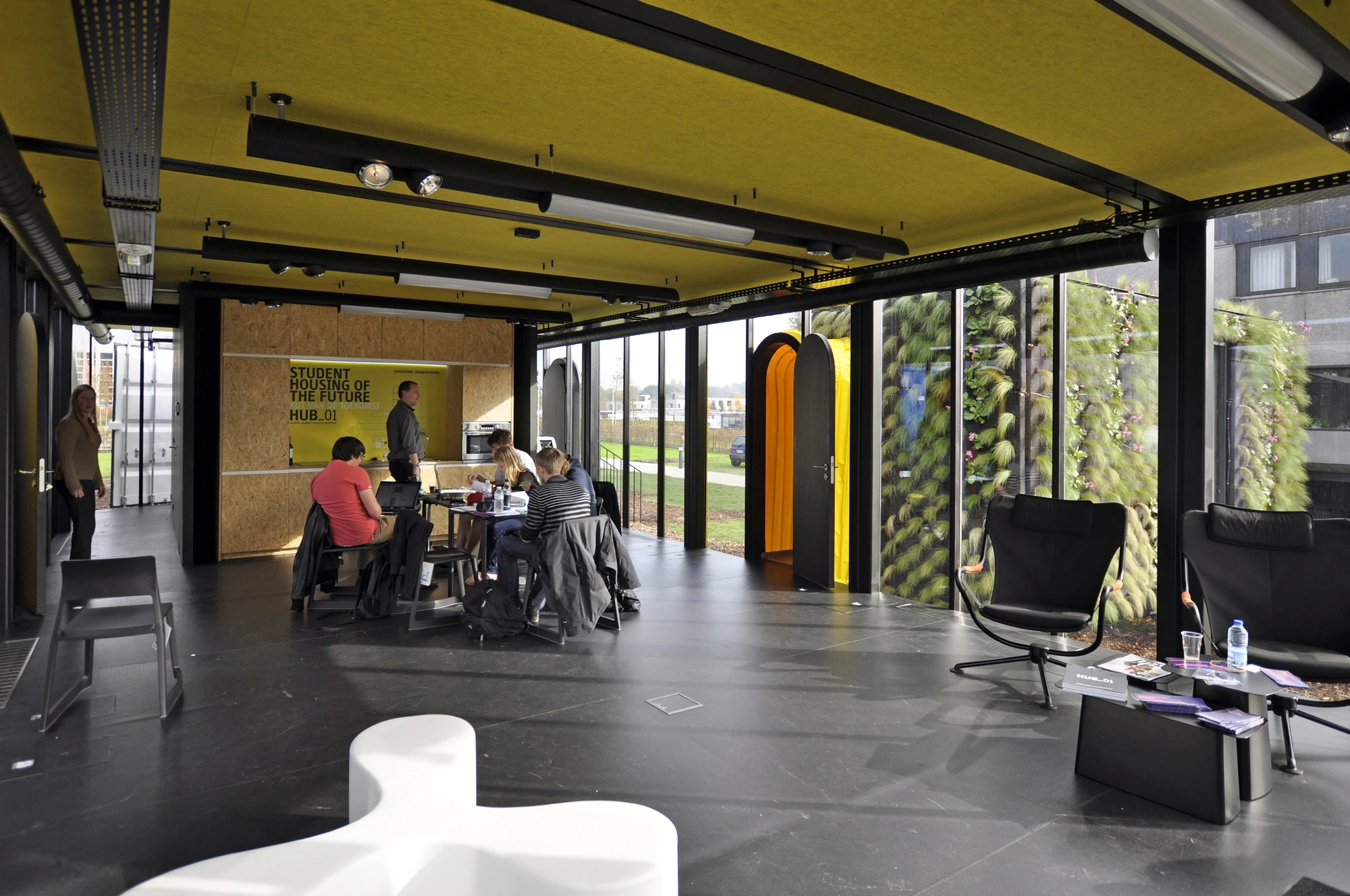The terminal is constructed around a large central hub which offers a meeting space for students