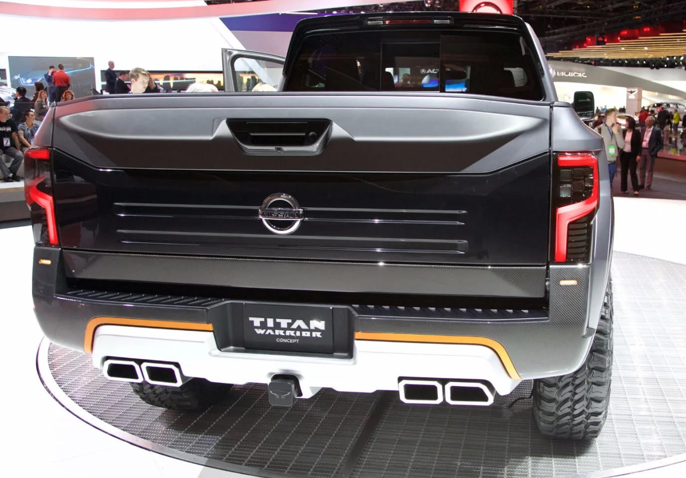 The quad exhaust is integrated into the rear bumper design