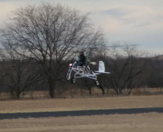 The Super Sky Cycle coming in for a gentle landing. Larry Neal is the pilot.