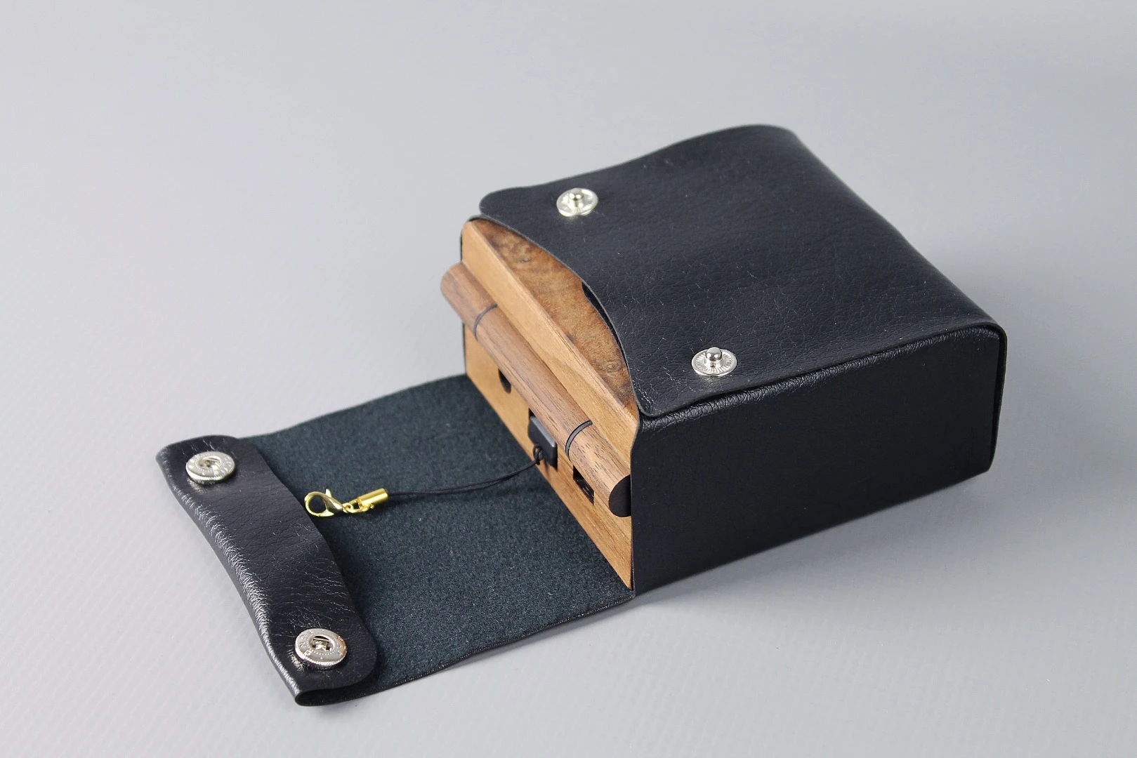 The Pixel Vision: A Game Boy replica fitted into a wooden box that can flip open