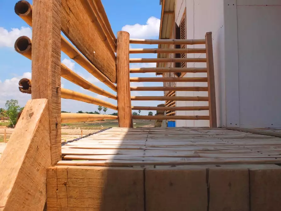 The two-story Framework House measures a total of 80 sq m (861 sq ft) and costs just US$2,500 to build