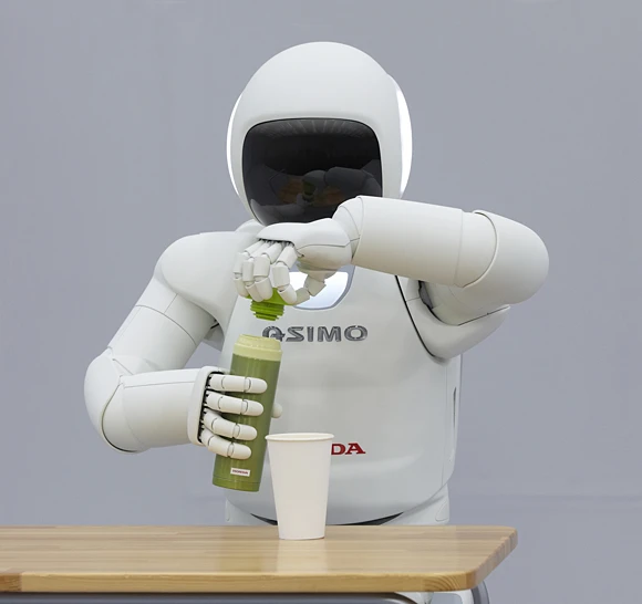 ASIMO can grab a glass water bottle, and remove the twist-cap