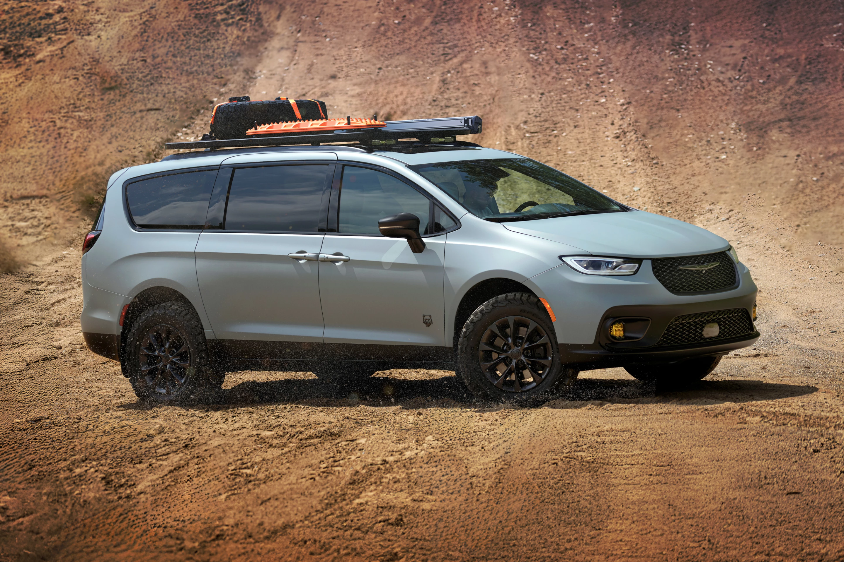 With its suspension lift, off-road tires, full-length roof rack and available interior sleeping space, the Grizzly Peak concept chases adventures that the average minivan leaves on the table