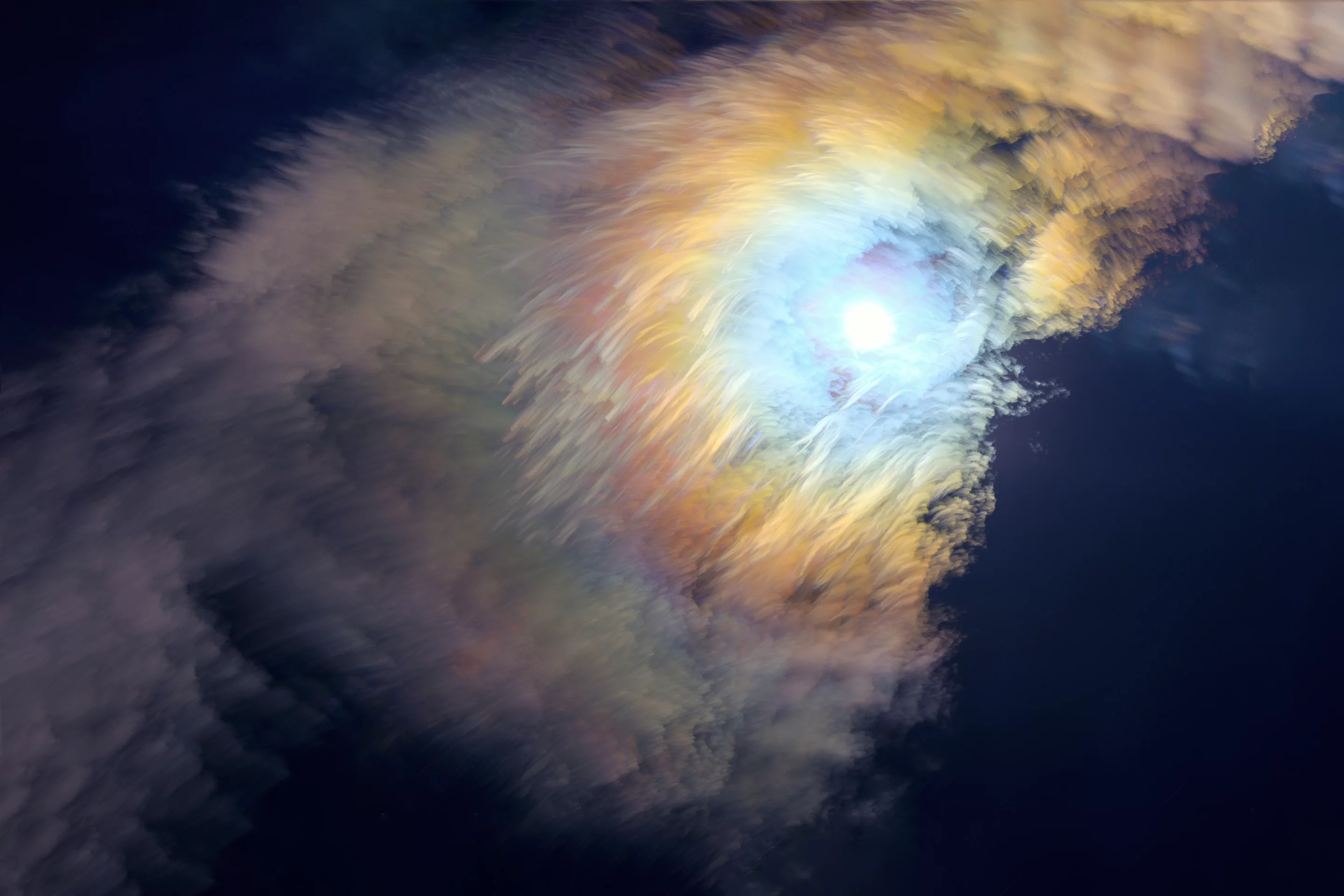 The image showcases the magnificent corona of the Moon and the motion of the clouds resembling colorful brushstrokes on a painting. The photographer used dozens of pictures to build a stack. For the photographer this is one of the most beautiful images of the brightest and largest object in our night sky and it resembles a seven-color feather growing out of the Moon.Dongguan, China, 28 July 2018