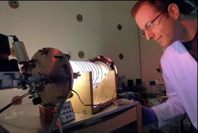 Dr. Toby Jenkins of the University of Bath using a plasma reactor to deposit antimicrobial coatings