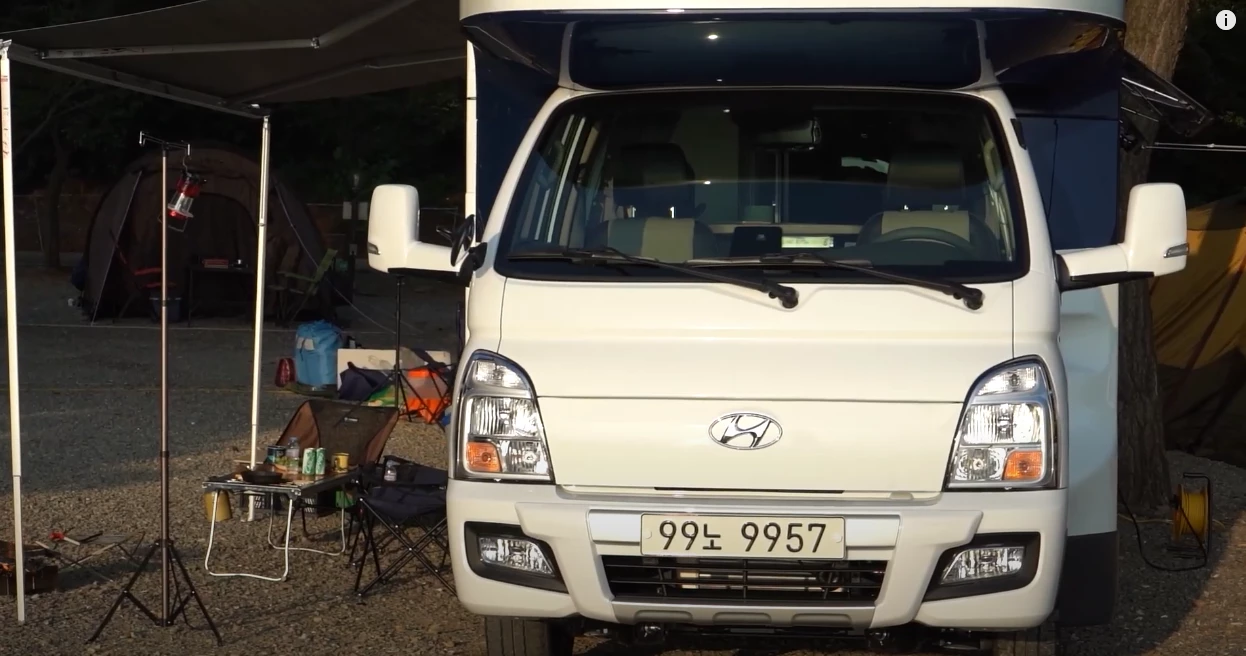 The Porest is built on the Hyundai Porter II truck chassis and includes widened side-view mirrors for seeing around the motorhome box
