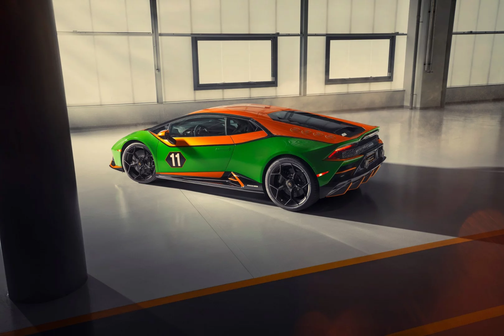 Colored brake calipers, single nut racing wheels, and the number 11 adorn all of the Huracan EVO GT Celebration models
