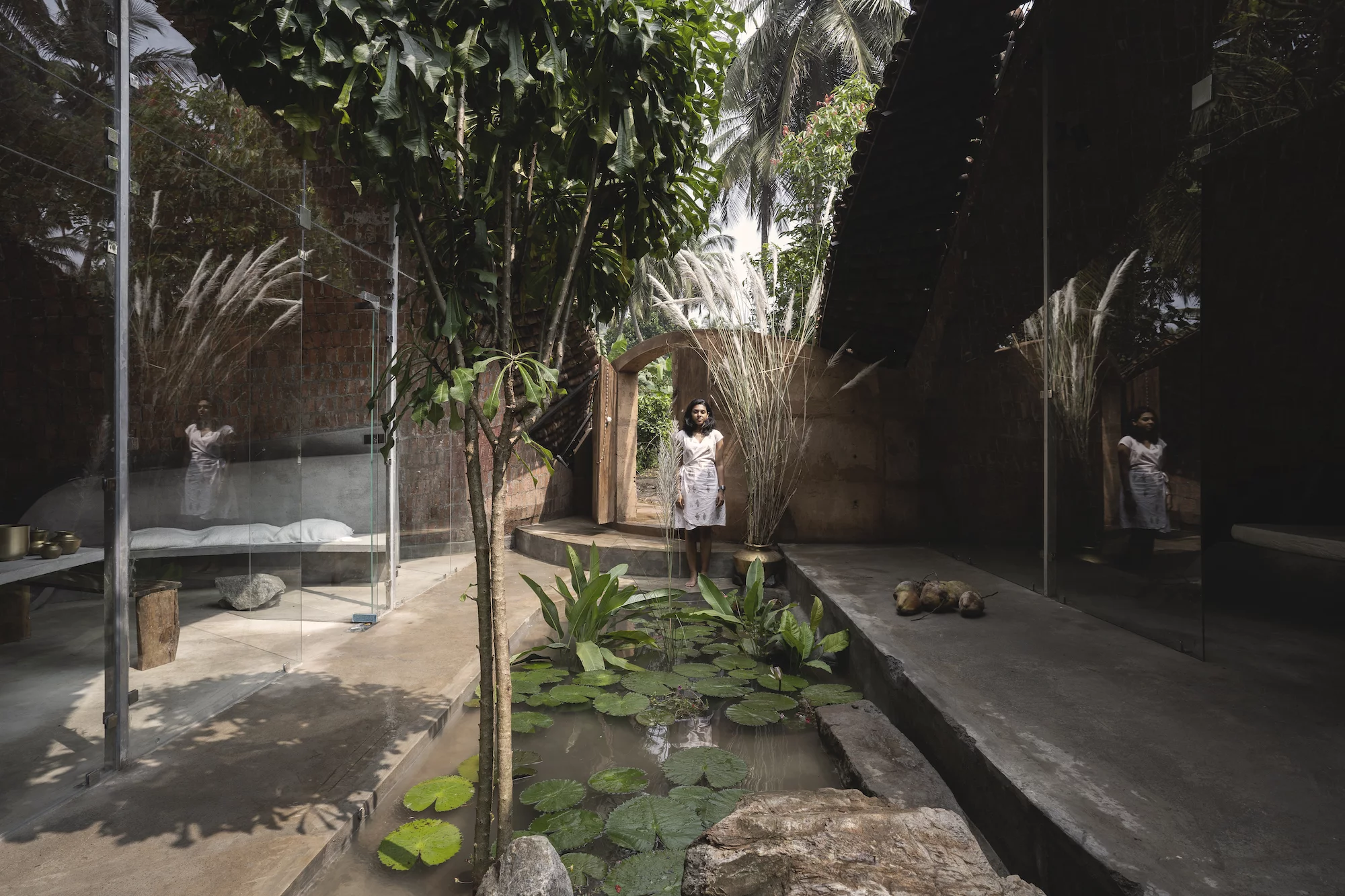 The Wendy House is made up of two living areas that are situated either side of a central courtyard and water feature