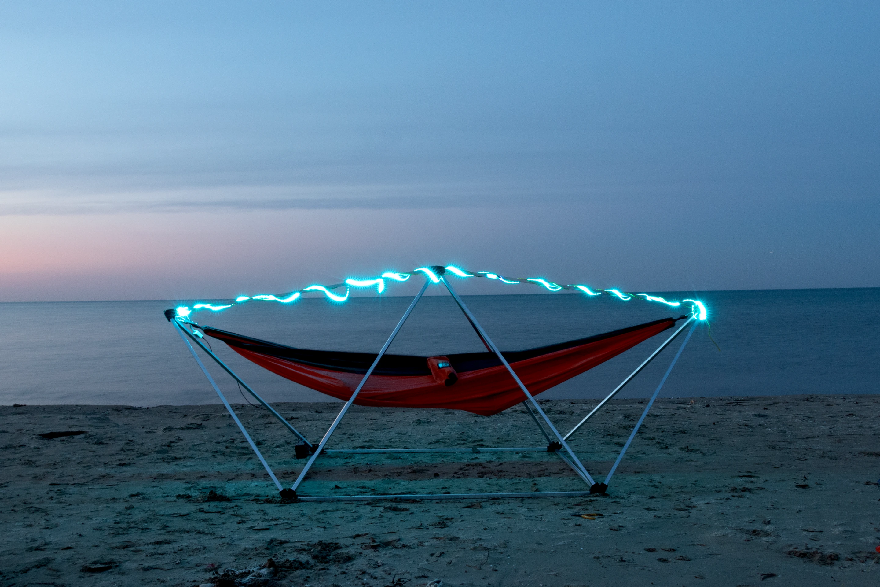 The aptly named Hang Solo uses a lightweight frame to suspend one's existing hammock in any location