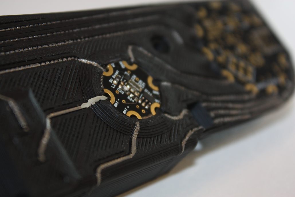 A close-up view of the IMPACT hand's 3D-printed circuitry